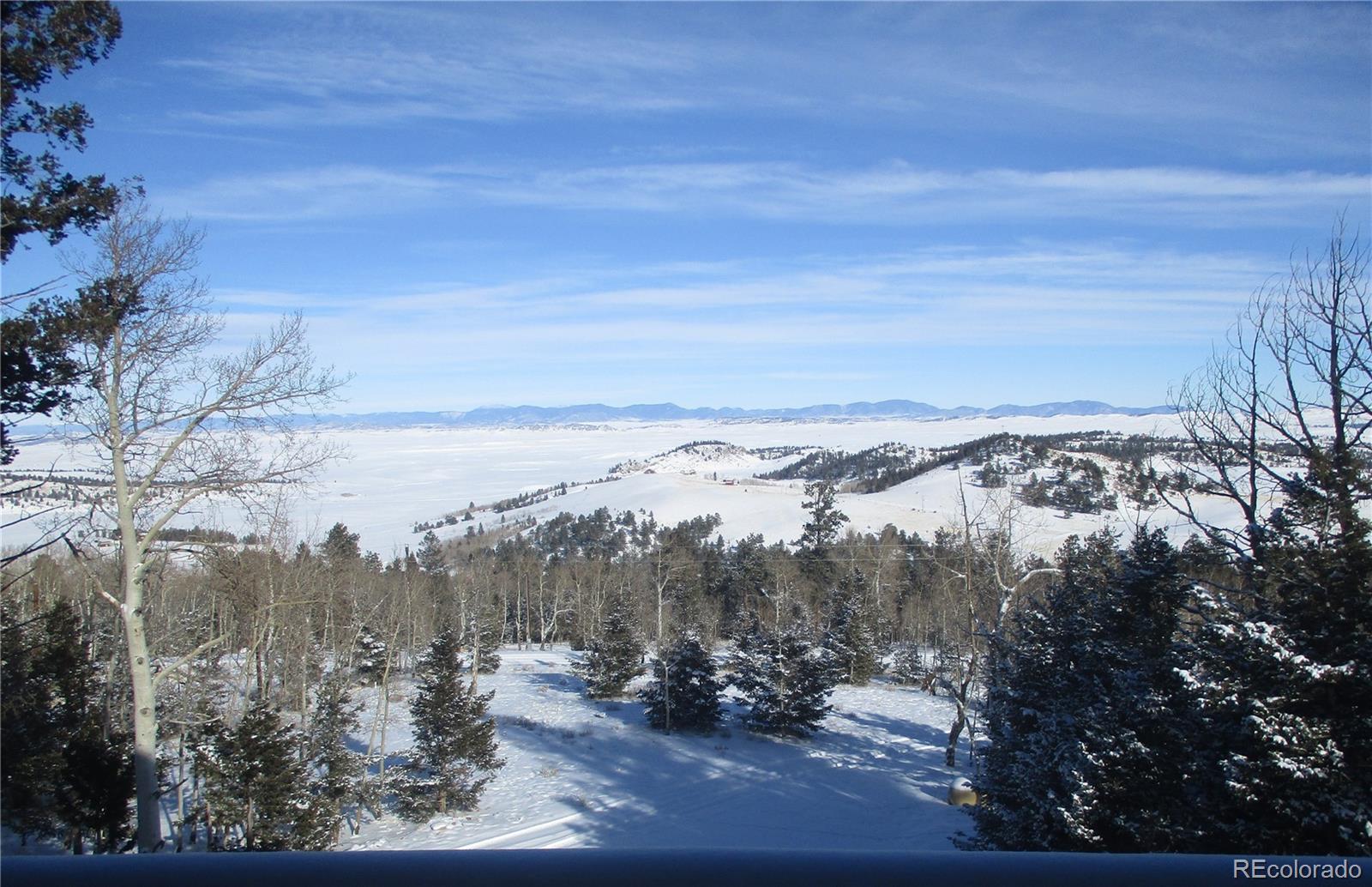 490 Blacksmith Road Hartsel, CO 80449 - Photo 10 of 12 a view of a city with mountains in the background