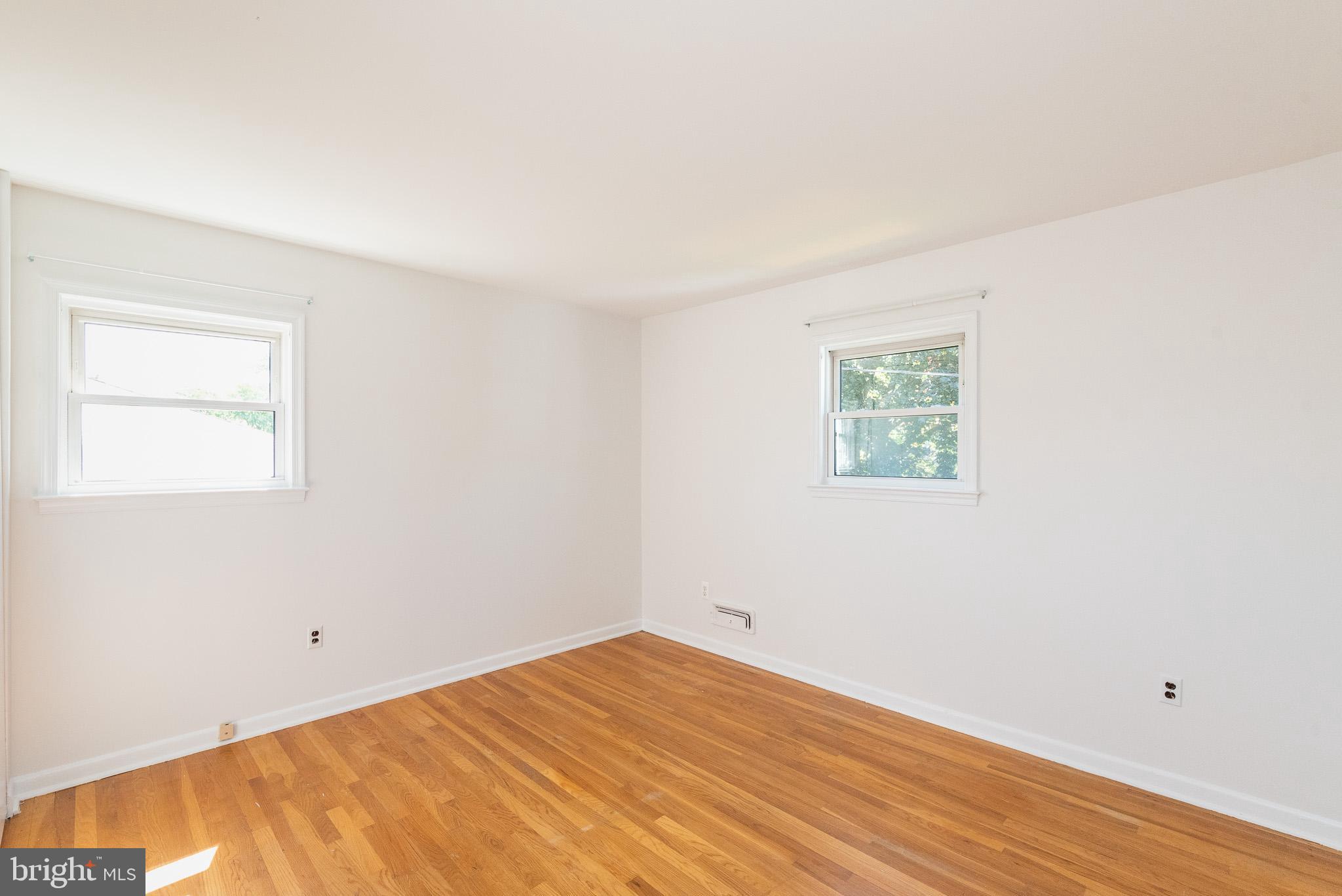 6129 Wheatland Road Baltimore, MD 21228 - Photo 18 of 48 a view of a room with wooden floor and cabinet