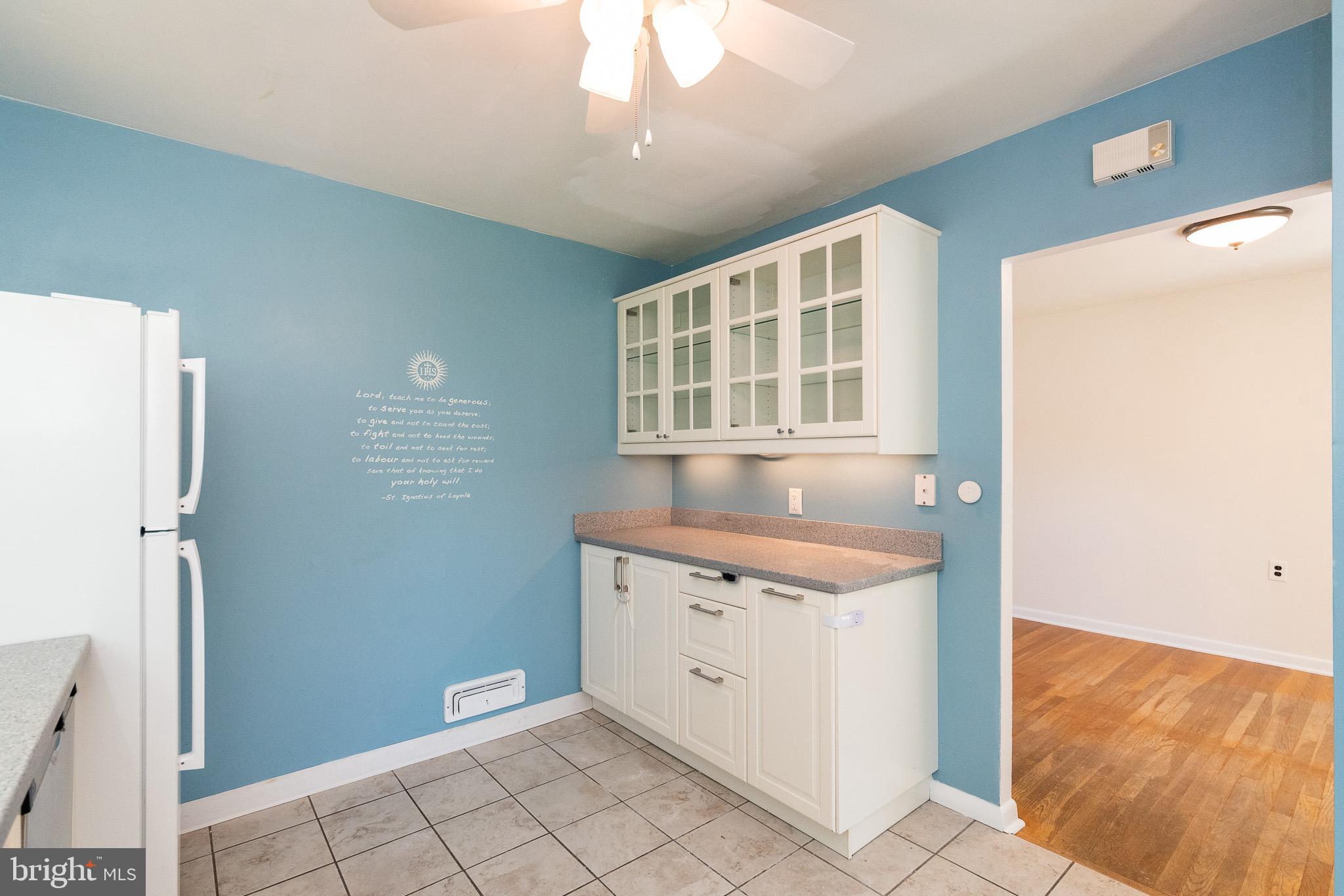 6129 Wheatland Road Baltimore, MD 21228 - Photo 5 of 48 a view of a kitchen with a sink