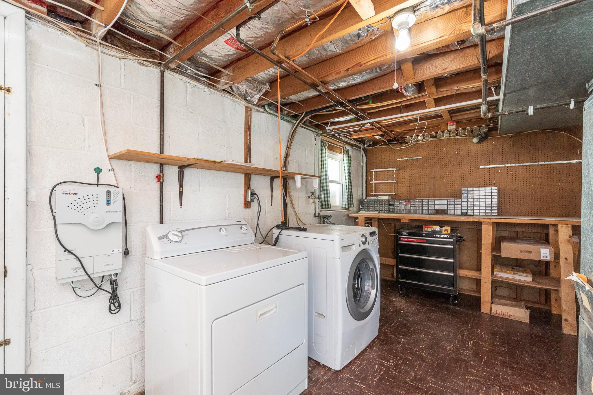 6129 Wheatland Road Baltimore, MD 21228 - Photo 43 of 48 a utility room with dryer and washer