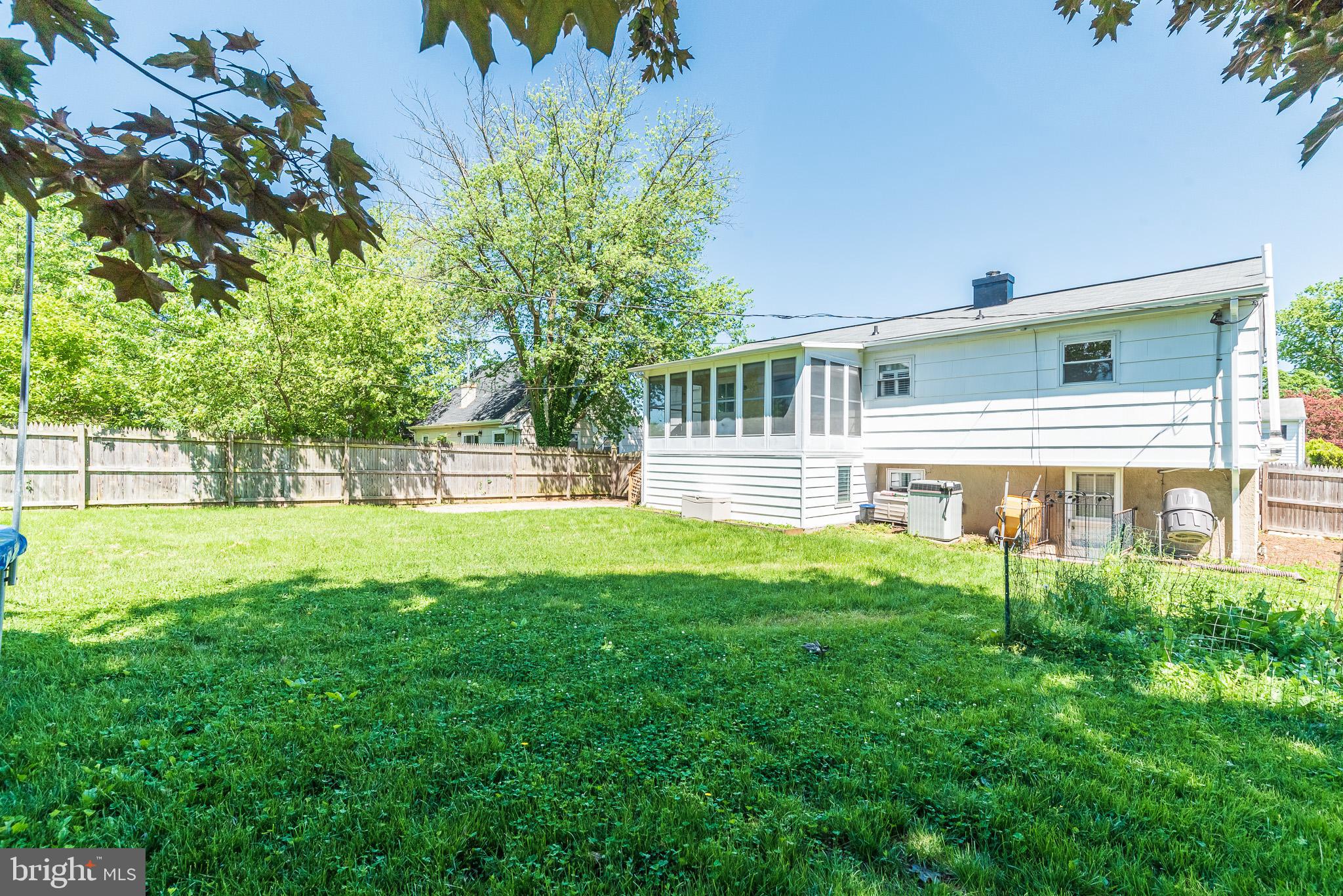 6129 Wheatland Road Baltimore, MD 21228 - Photo 47 of 48 a view of house with a backyard