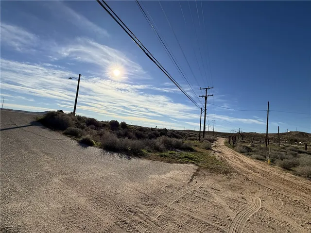 a view of a backyard of a house