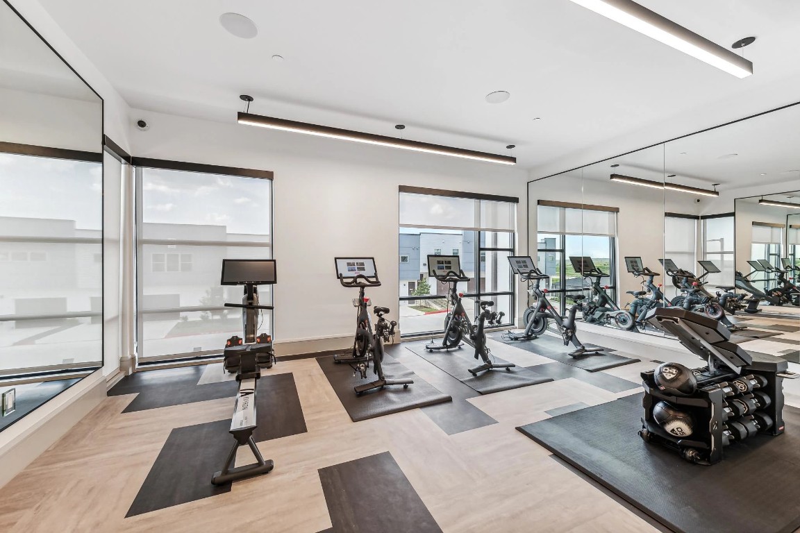 10350 Blue Bluff Road, Unit 10101 Austin, TX 78724 - Photo 22 of 27 a view of a room with gym equipment