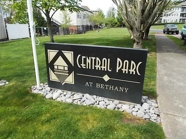 a view of a park that has sign board