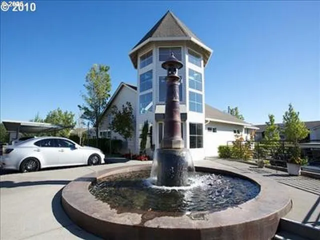 a view of a house with a sink and a fire pit