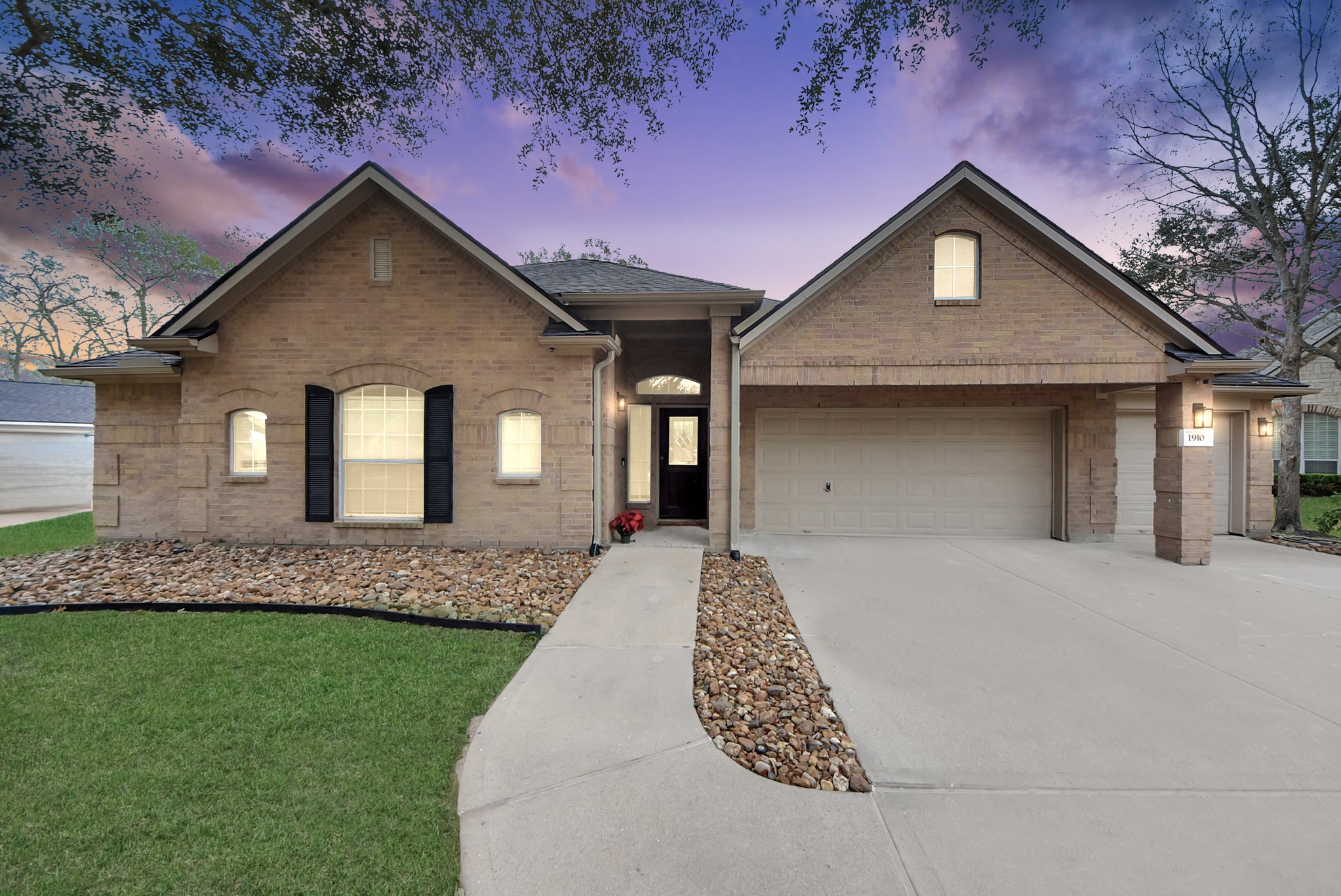 1910 Fox Path Court Katy, TX 77494 - Photo 2 of 29 a front view of a house with a garden and yard