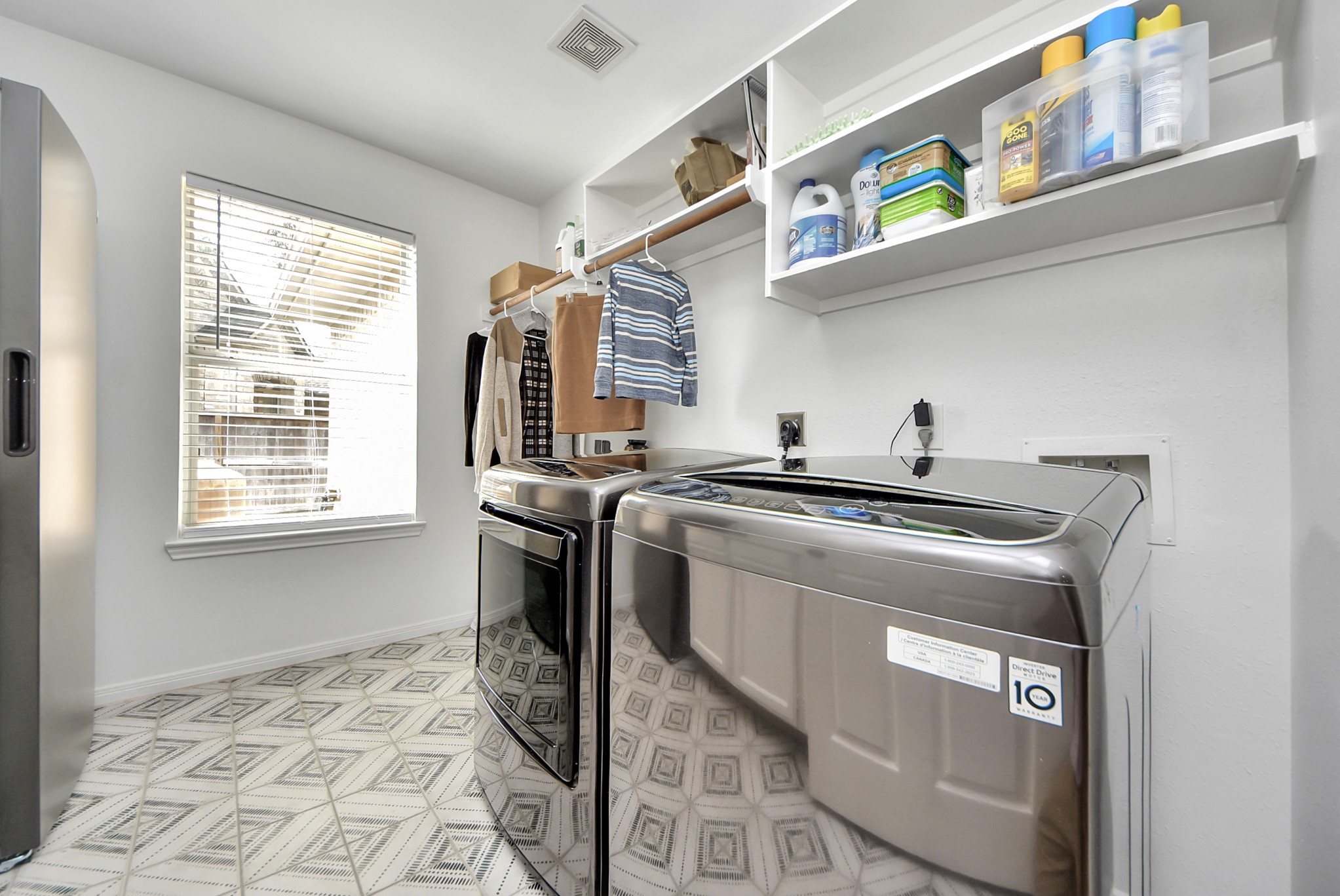 1910 Fox Path Court Katy, TX 77494 - Photo 23 of 29 a utility room with dryer and washer