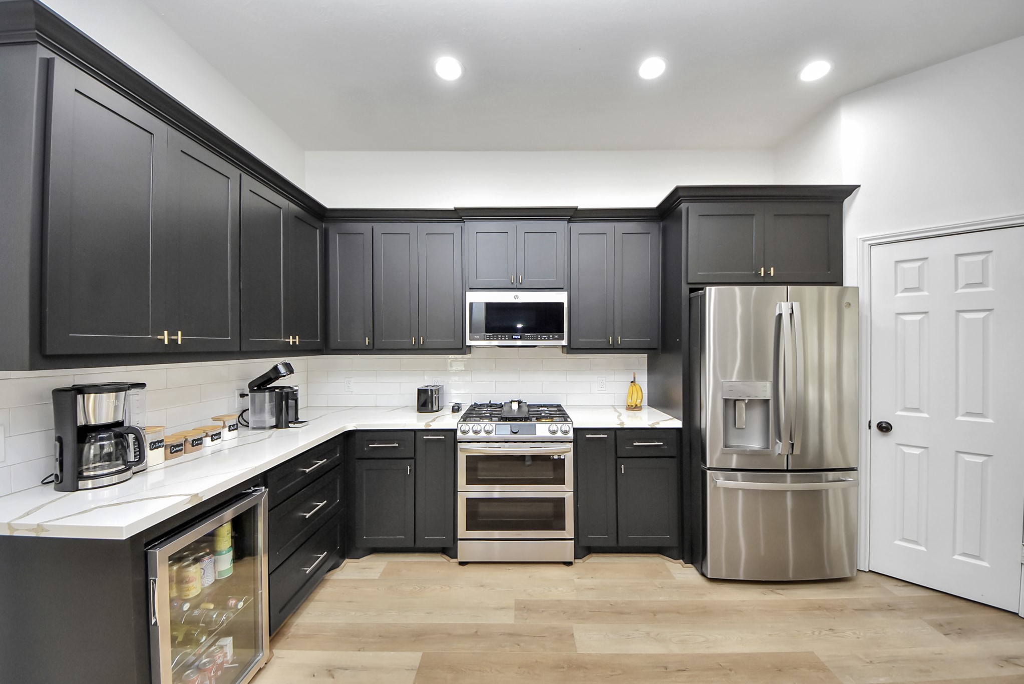 1910 Fox Path Court Katy, TX 77494 - Photo 5 of 29 a kitchen with stainless steel appliances granite countertop a sink stove and refrigerator