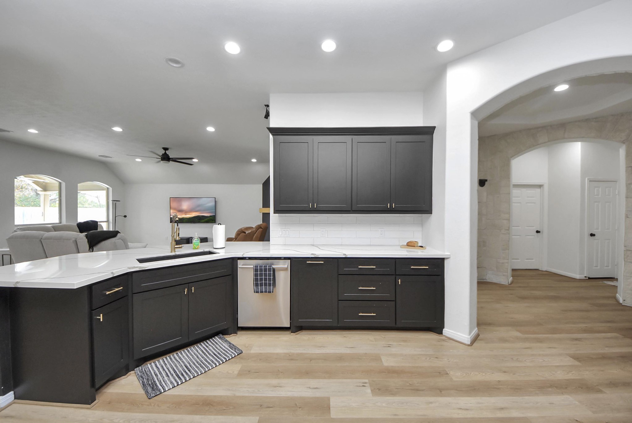 1910 Fox Path Court Katy, TX 77494 - Photo 6 of 29 a large bathroom with a sink and a mirror