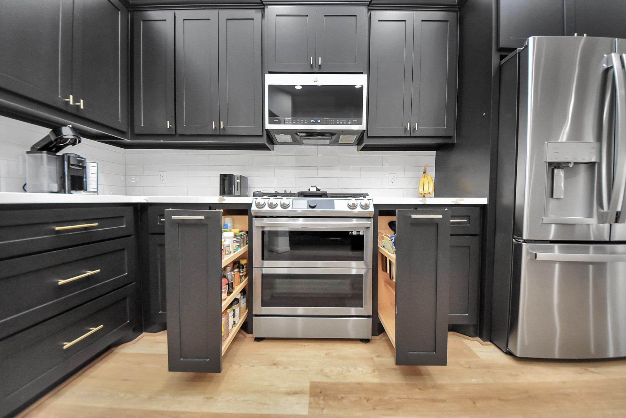 1910 Fox Path Court Katy, TX 77494 - Photo 8 of 29 a kitchen with stainless steel appliances granite countertop a refrigerator stove and cabinets