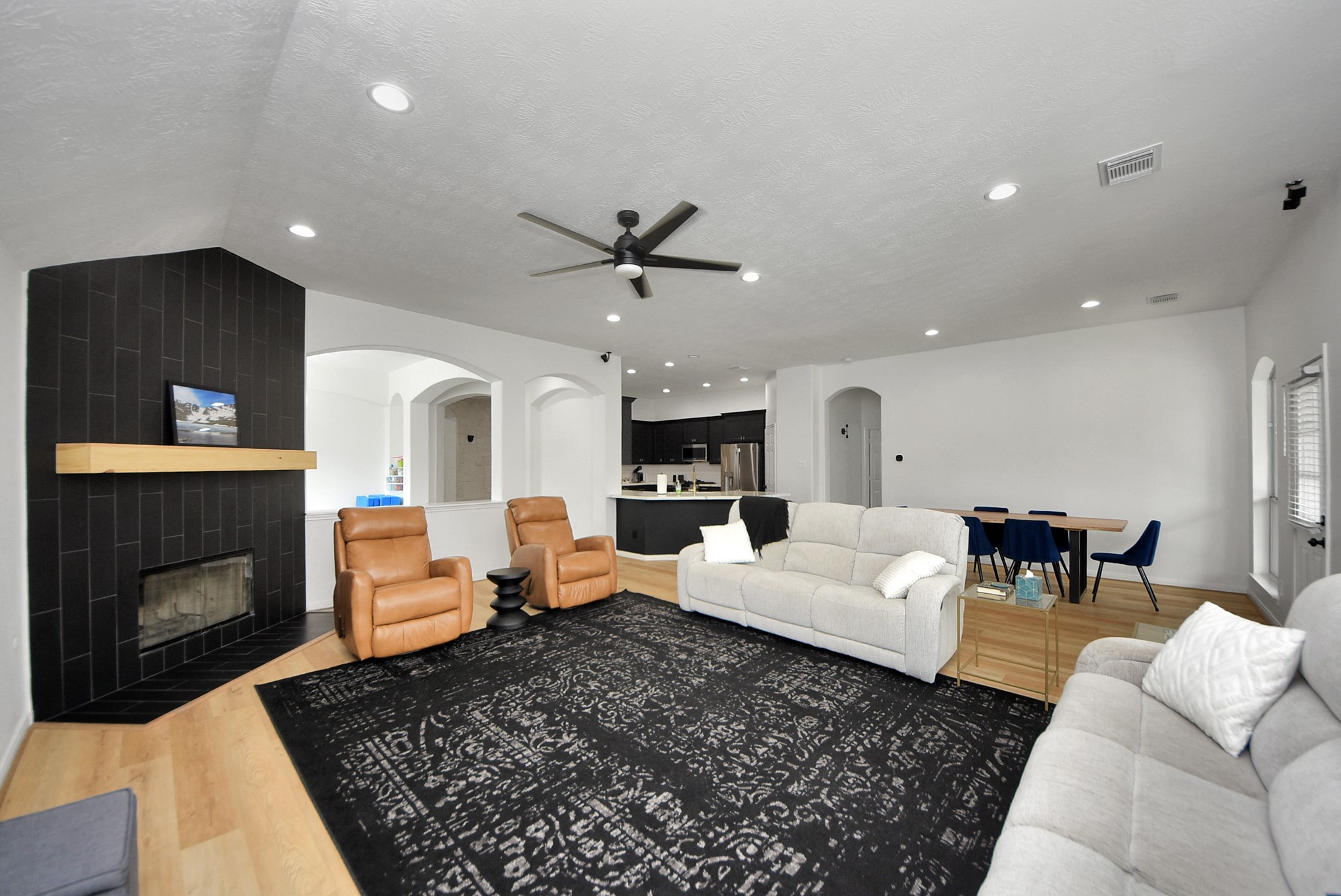 1910 Fox Path Court Katy, TX 77494 - Photo 10 of 29 a living room with furniture fireplace and window