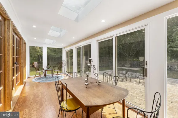 a view of a balcony with wooden floor