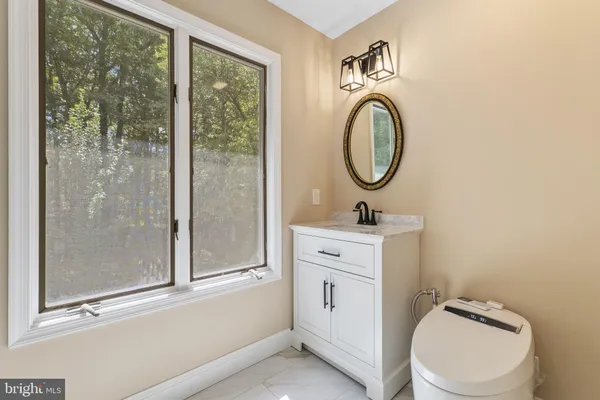 a bathroom with a shower and a tub