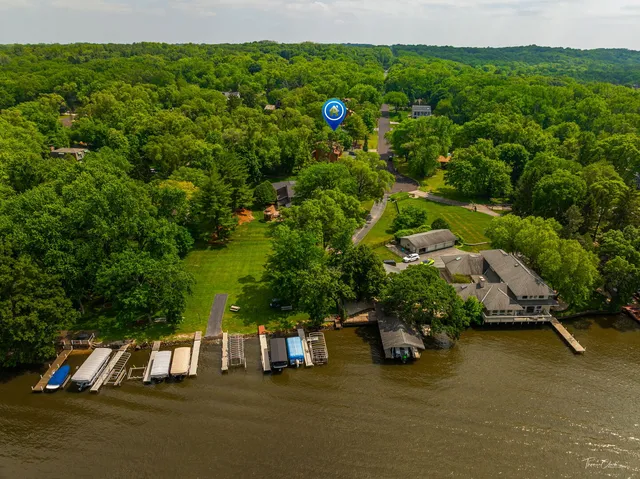 a view of a park with large trees