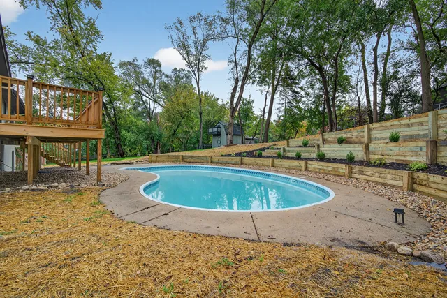 a view of yard with large trees