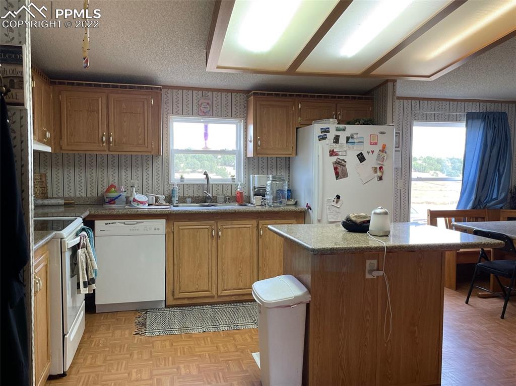 1526 R Path Cotopaxi, CO 81223 - Photo 17 of 30 a kitchen with sink cabinets and window