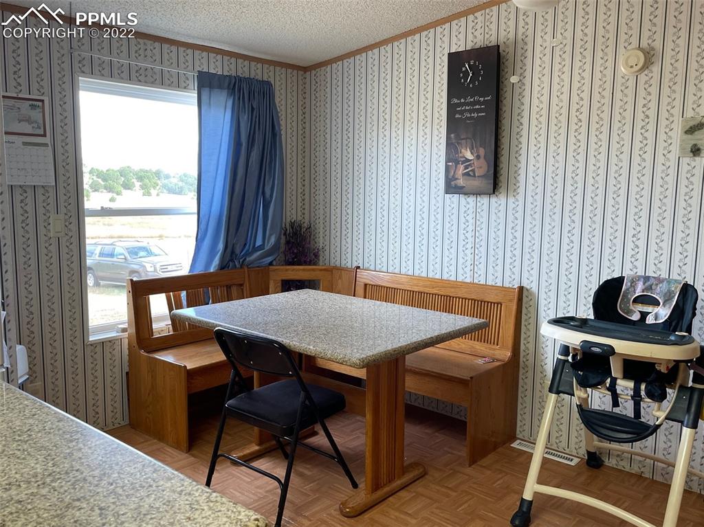 1526 R Path Cotopaxi, CO 81223 - Photo 8 of 30 a dining room with furniture and window