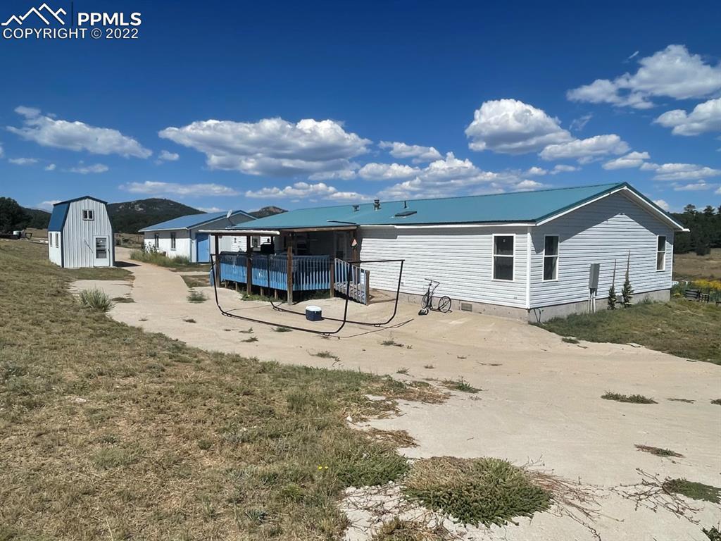 1526 R Path Cotopaxi, CO 81223 - Photo 10 of 30 a view of a house with a backyard