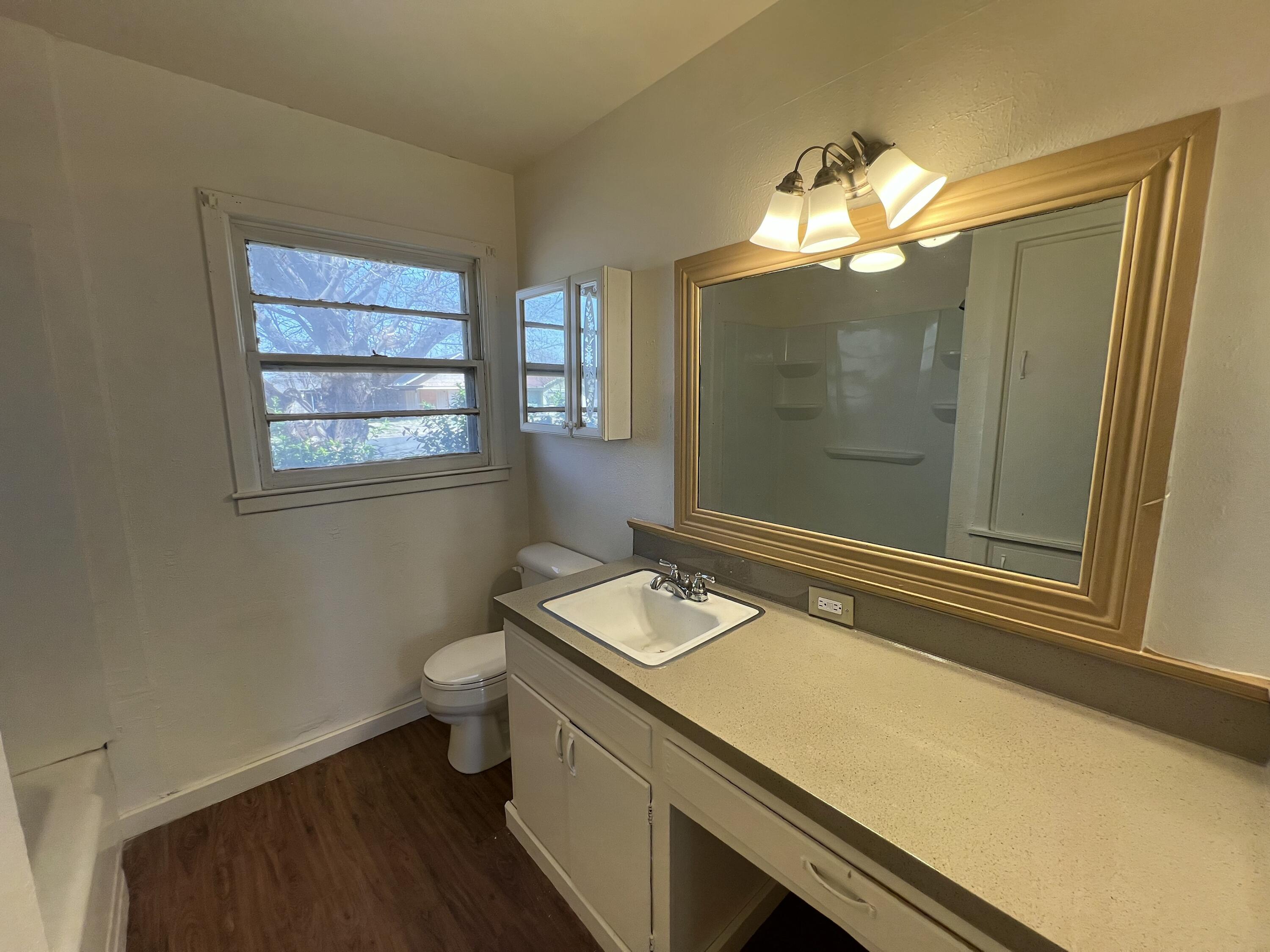 1907 45th Street Lubbock, TX 79412 - Photo 12 of 16 Hallway Bathroom