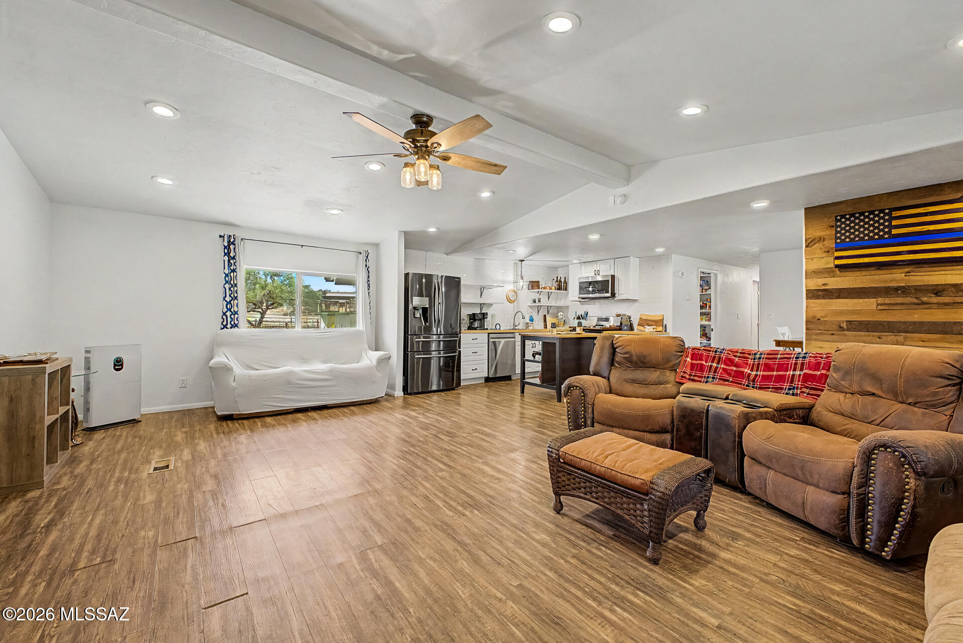 4231 East Pinal Street Tucson, AZ 85739 - Photo 6 of 36 a living room with furniture and a wooden floor