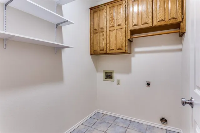 a bathroom with a shower and a window