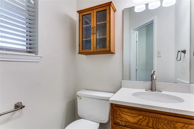 a bathroom with a sink and a toilet