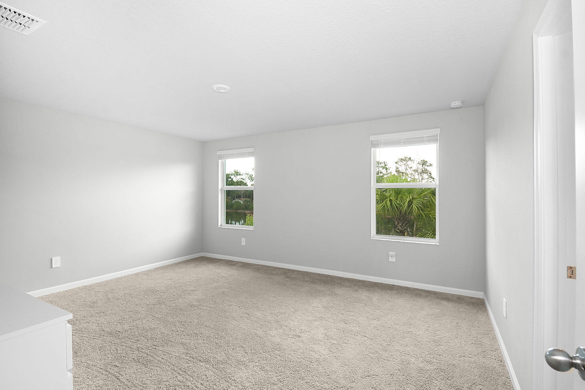 5766 Southeast Edgewater Circle Stuart, FL 34997 - Photo 19 of 41 Primary Bedroom
