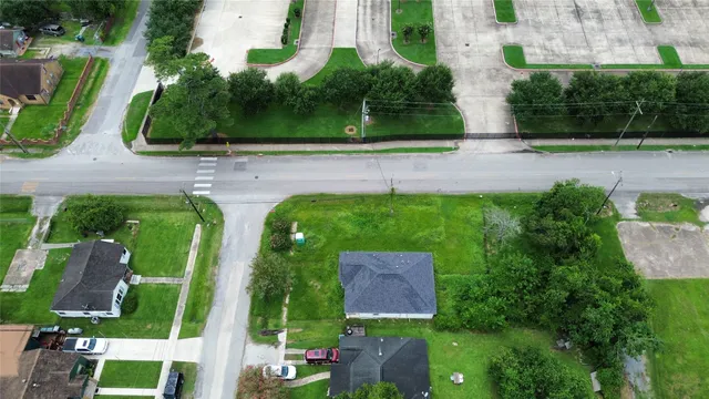 an aerial view of garden with swimming pool