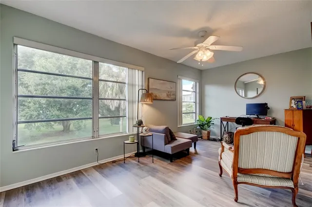 a living room with furniture and a window