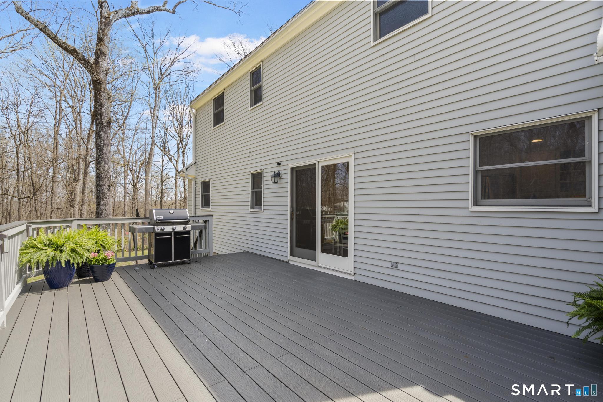 18 Edith Lane Wilton, CT 06897 - Photo 31 of 35 a view of a house with a roof deck