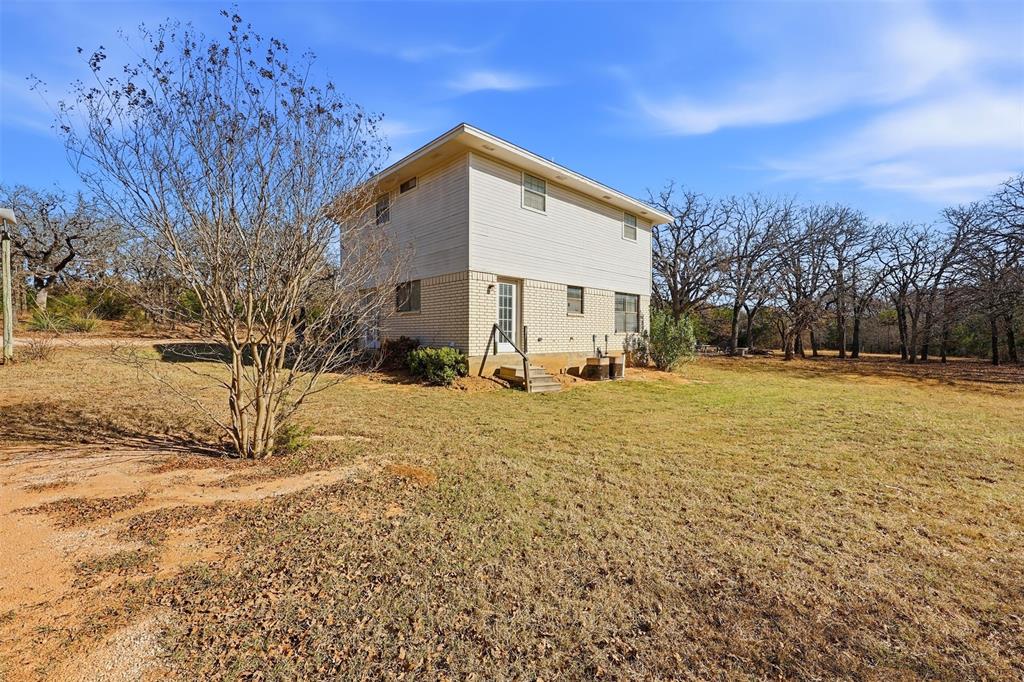 892 Hcr 1227 Whitney, TX 76692 - Photo 28 of 40 a view of road with large trees
