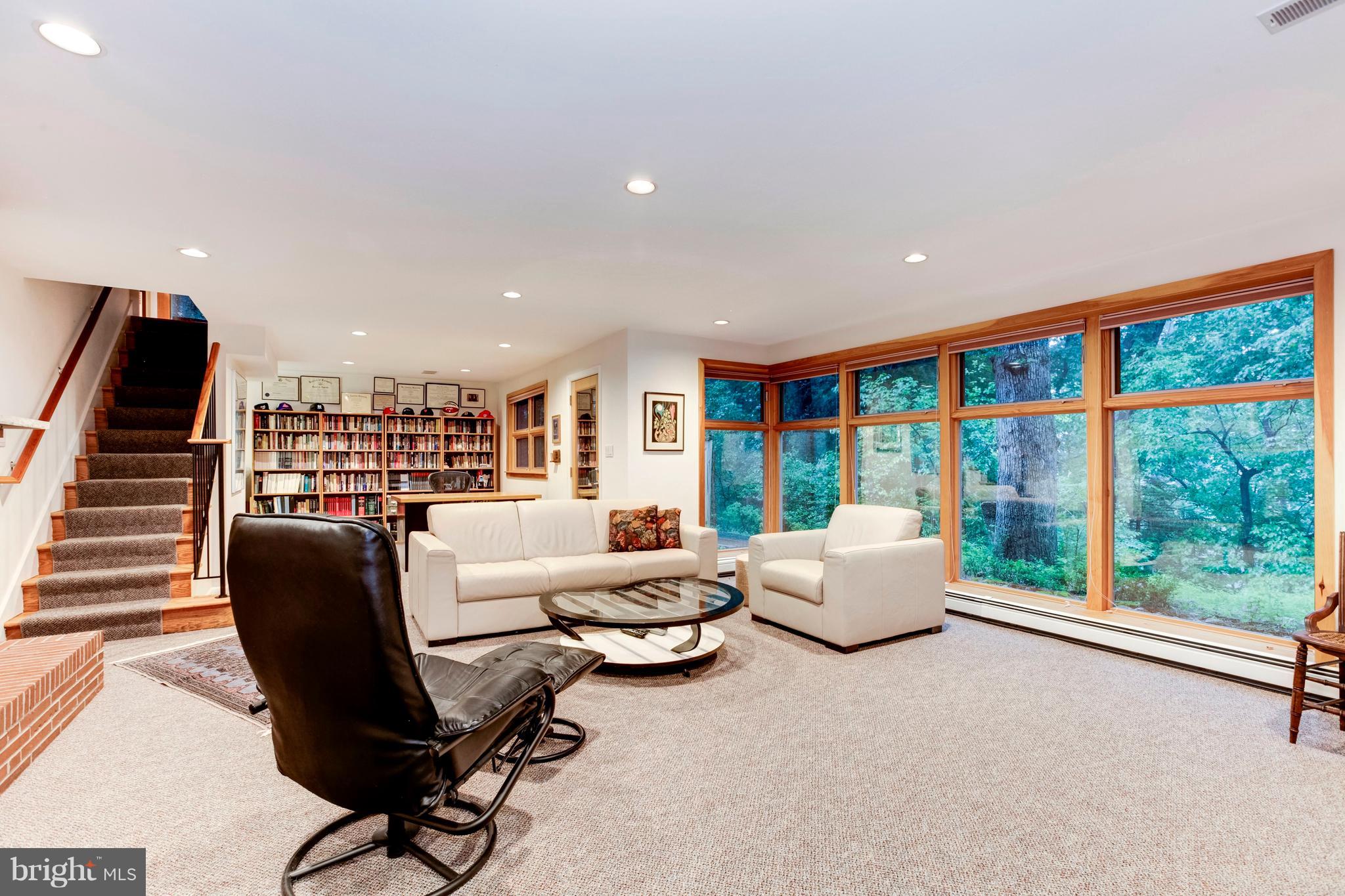 3309 Brooklawn Terrace Chevy Chase, MD 20815 - Photo 17 of 25 Lower Level Family Room with Gas Fireplace