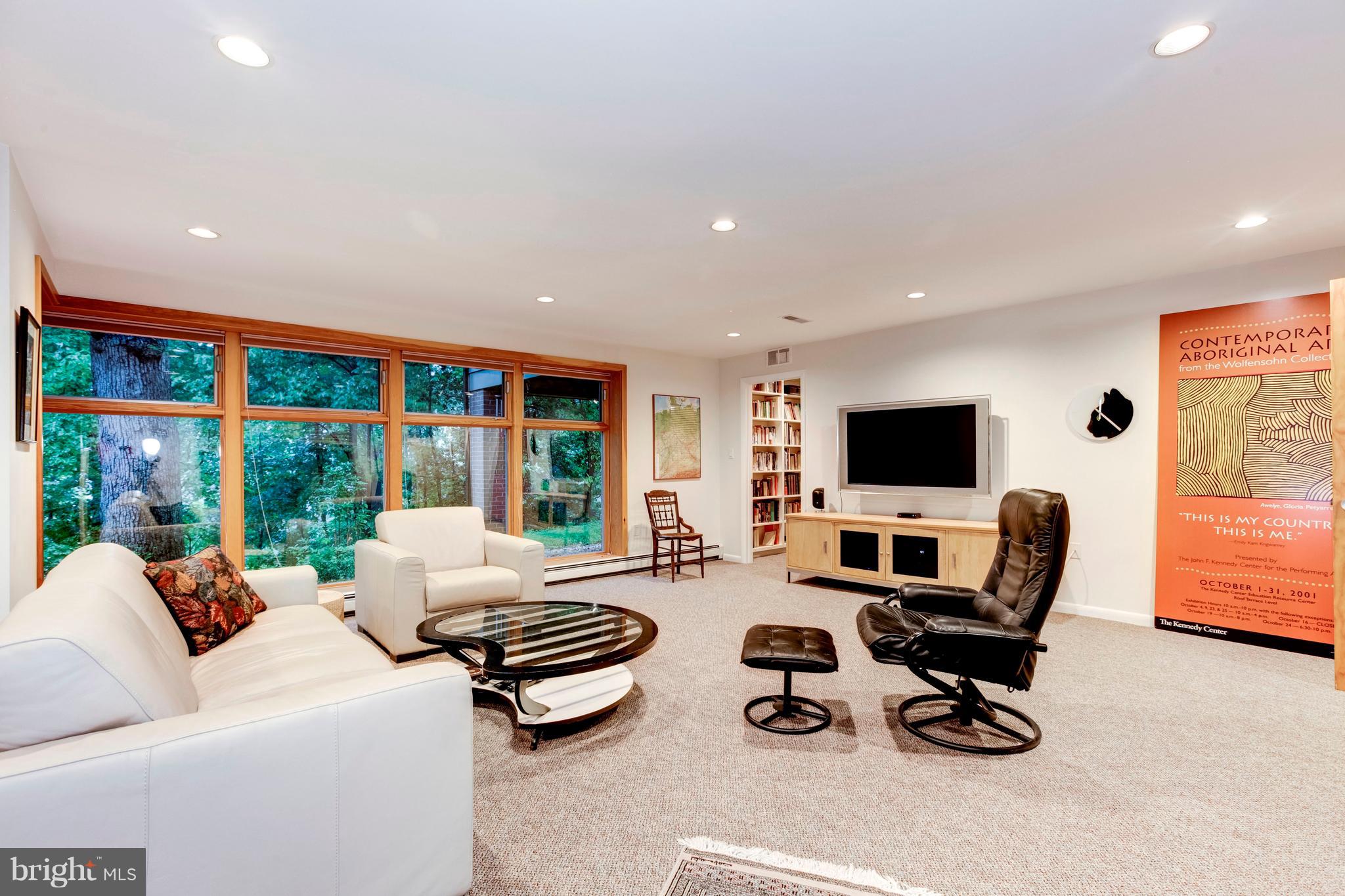 3309 Brooklawn Terrace Chevy Chase, MD 20815 - Photo 19 of 25 Lower Level Family Room with Gas Fireplace