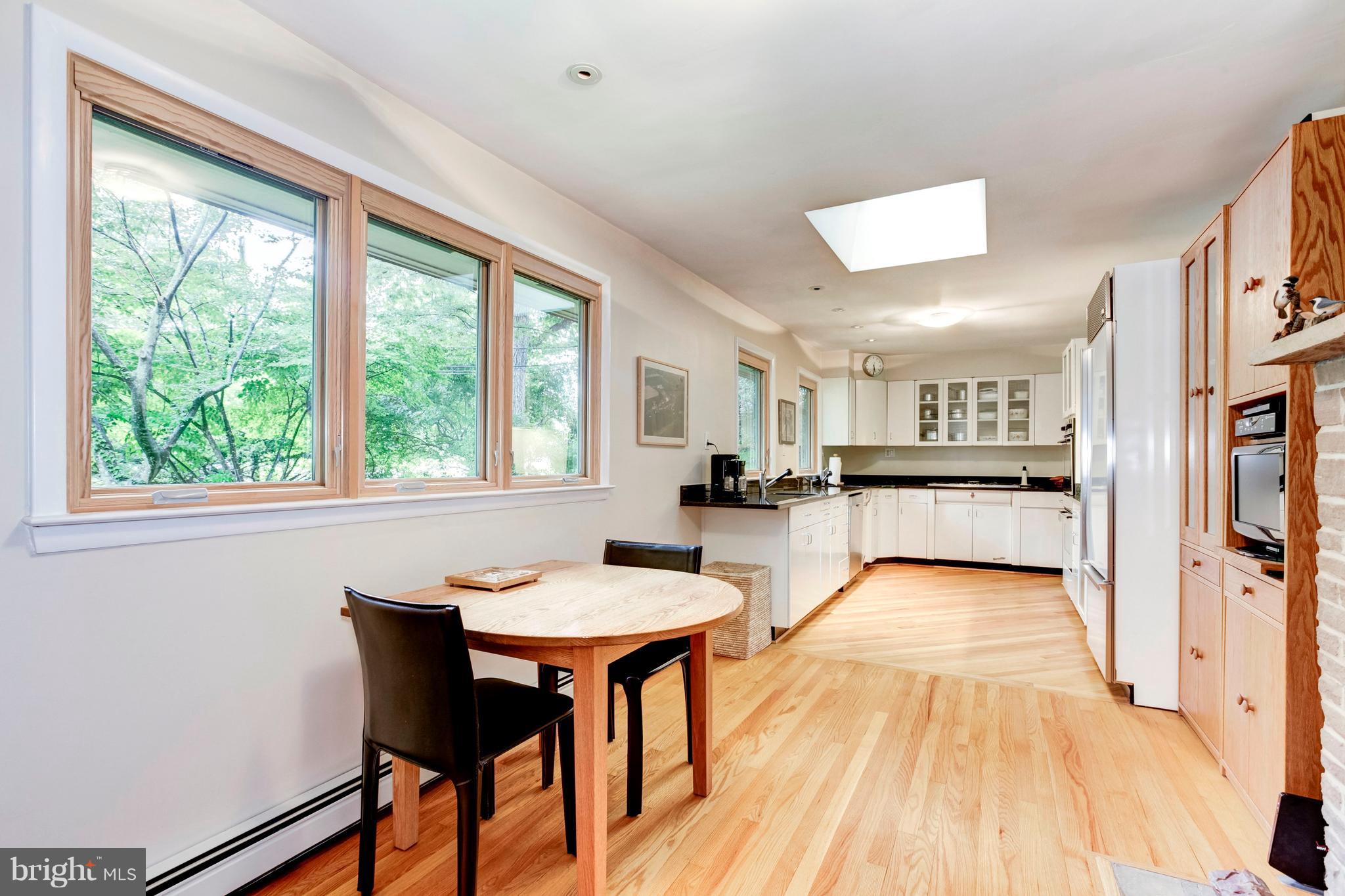 3309 Brooklawn Terrace Chevy Chase, MD 20815 - Photo 7 of 25 Table-Space Kitchen with Skylight