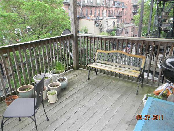 43 East Springfield Street, Unit 4 Boston, MA 02118 - Photo 5 of 6 a view of a chairs in patio