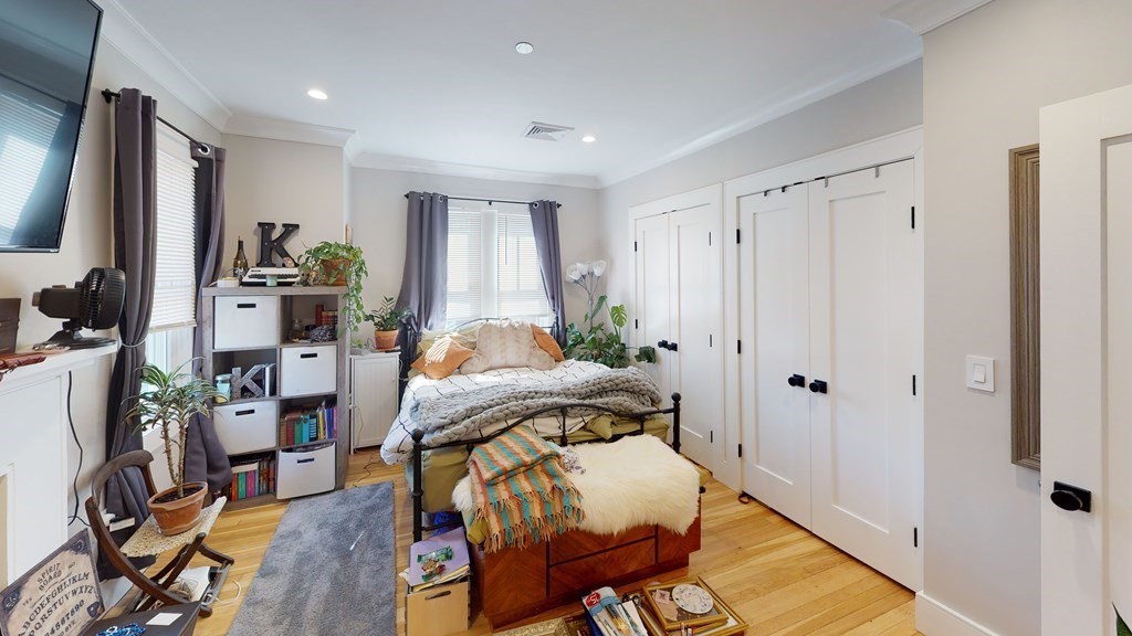 15 Lanark Road, Unit 3 Brookline, MA 02445 - Photo 7 of 9 a bed room with a bed and a window