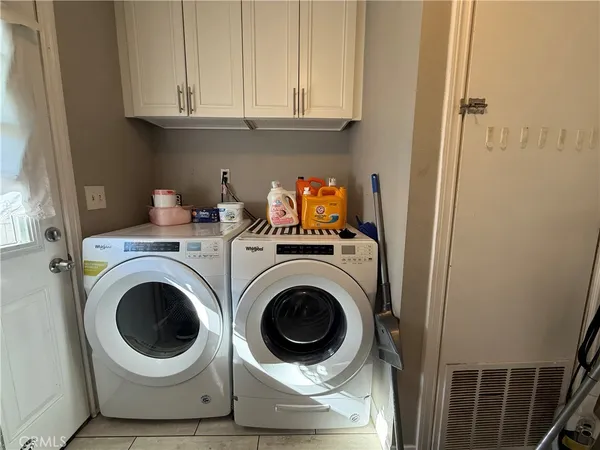 a room with storage and utility racks