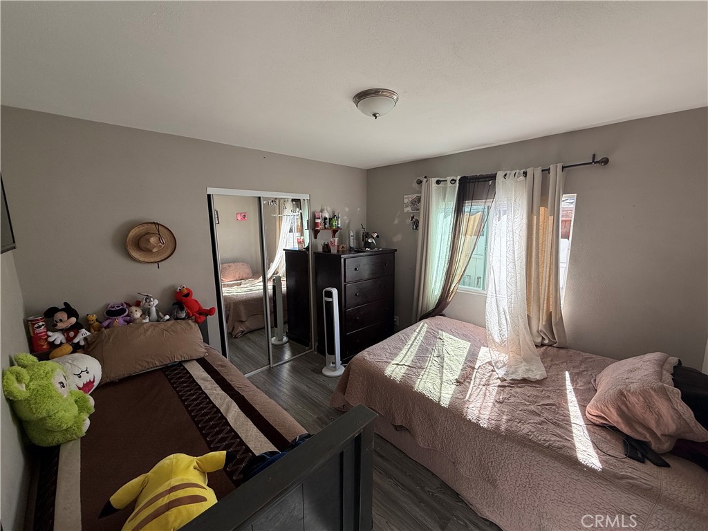 2601 East Victoria Street, Unit 404 Compton, CA 90220 - Photo 24 of 30 a room with furniture and a window