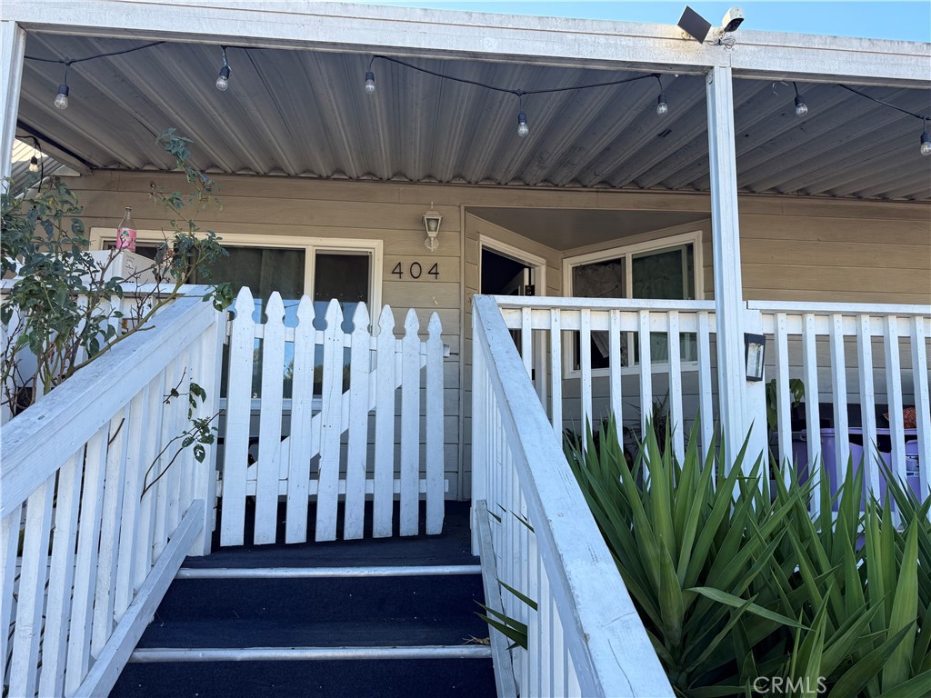 2601 East Victoria Street, Unit 404 Compton, CA 90220 - Photo 5 of 30 a view of a backyard with wooden fence