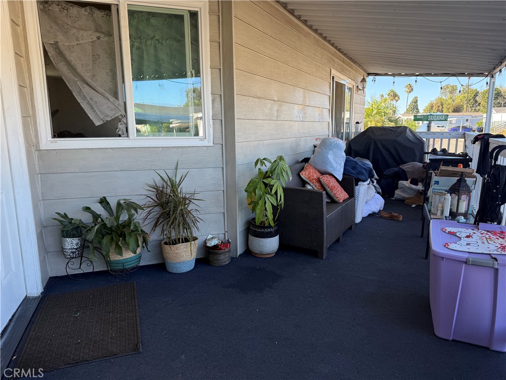 2601 East Victoria Street, Unit 404 Compton, CA 90220 - Photo 8 of 30 a living room with furniture