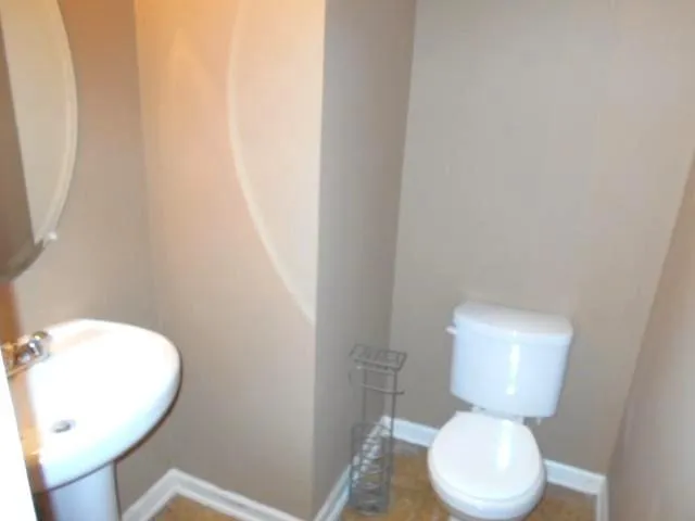 a view of a hallway with staircase