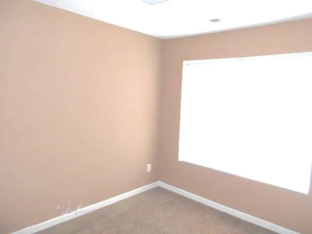 a view of a small space with a window