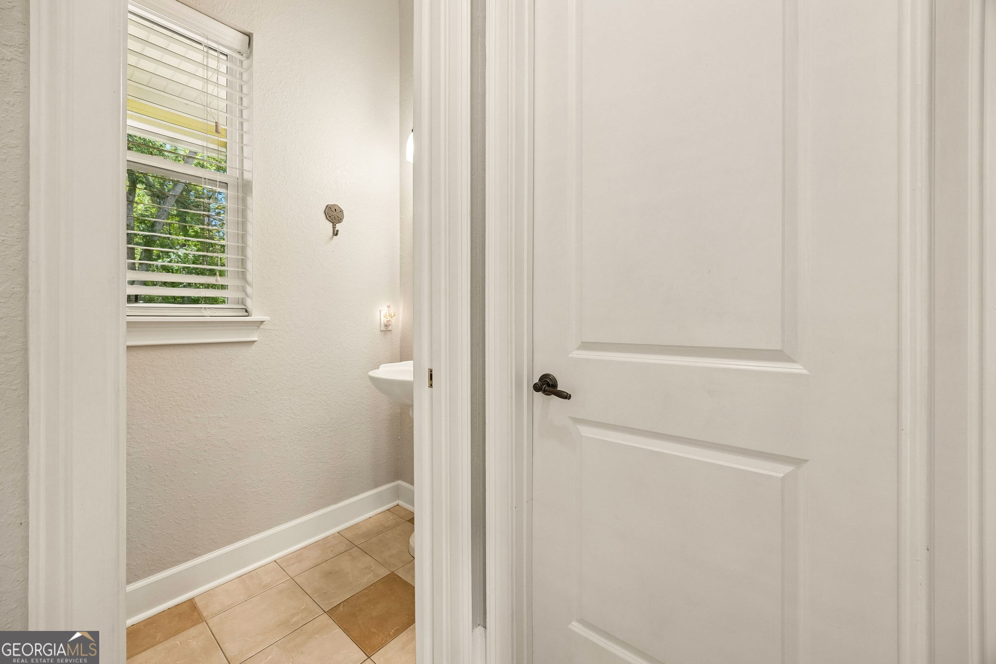 706 Hopewell Point Road White Oak, GA 31568 - Photo 28 of 84 Additional view of the main-level powder room, perfectly positioned for guests and everyday convenience.