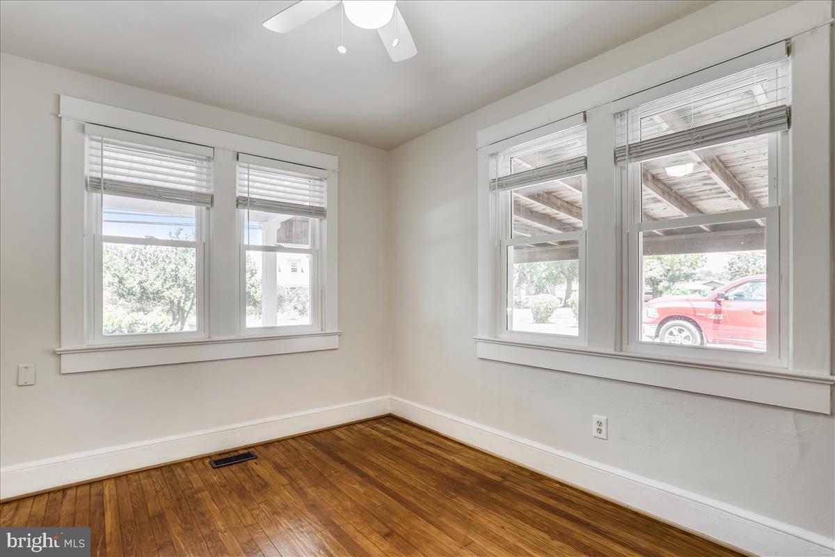1121 Old Rixeyville Road Culpeper, VA 22701 - Photo 19 of 35 Lighted ceiling fan and ample windows