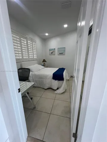 a view of entryway with a kitchen