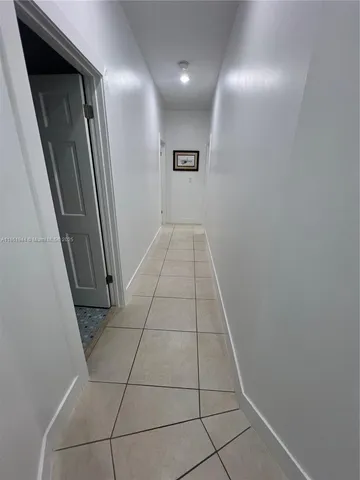 a bedroom with a bed and a cabinets