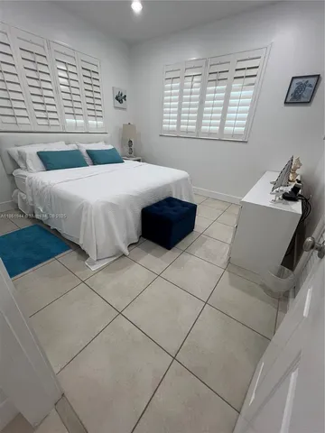 a view of a hallway with windows