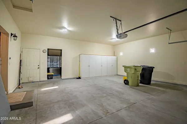a view of an empty room with stairs