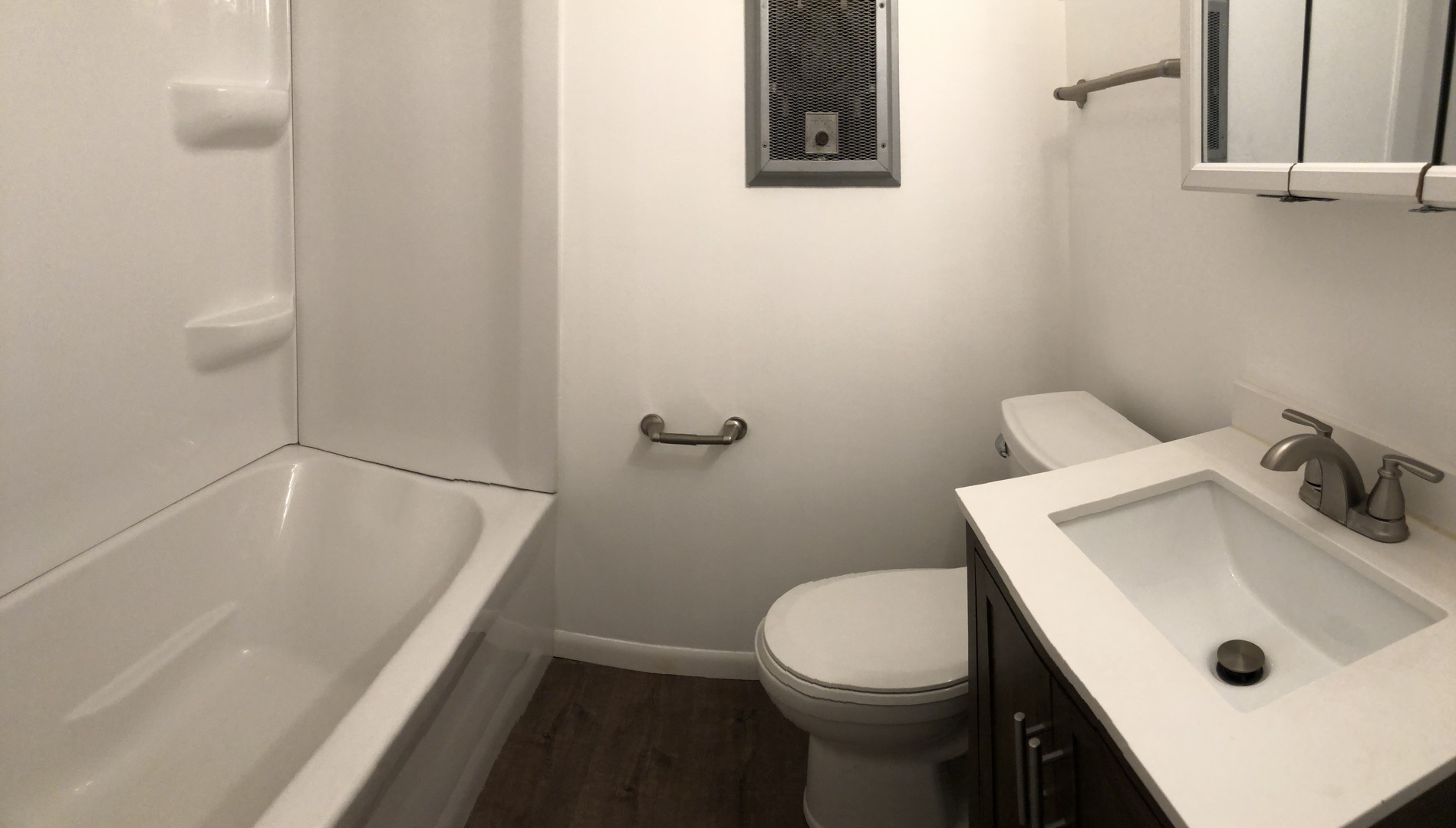 85 North Lyle Avenue, Unit 5 Elgin, IL 60123 - Photo 8 of 11 a bathroom with a sink and a toilet