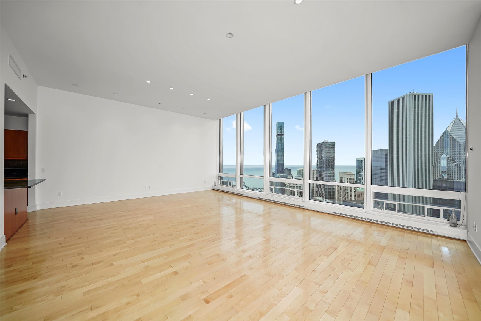 401 North Wabash Avenue, Unit 49I Chicago, IL 60611 - Photo 8 of 16 a view of an empty room with glass door